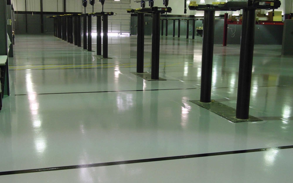 shiny new flooring in a large automotive garage